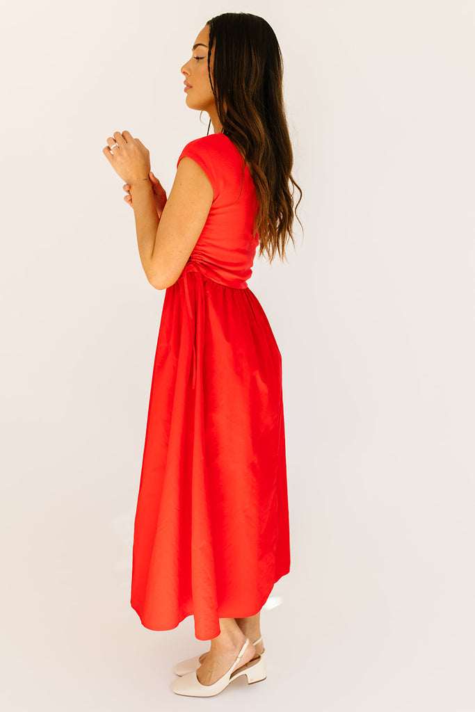 zoco afterglow dress: red short sleeve midi dress with a square neckline and side ties. perfect for date nights, weddings, and family pictures.