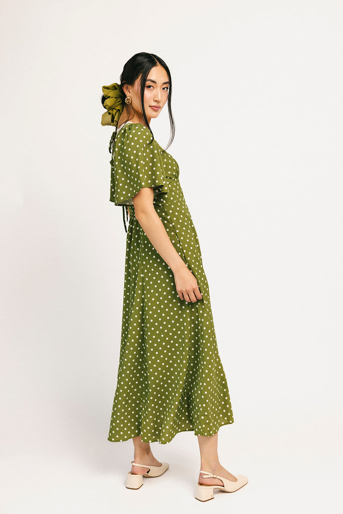 please hold polka dot dress // green