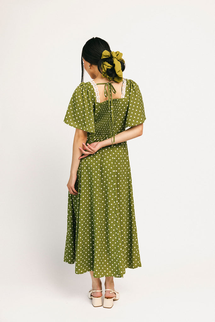please hold polka dot dress // green