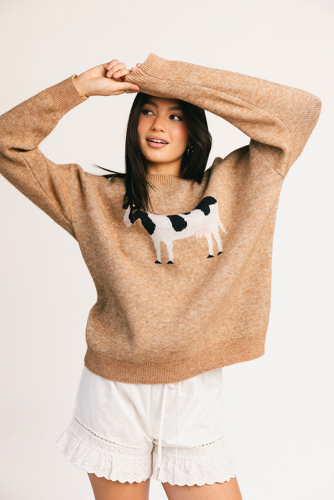 crewneck cow sweater with a relaxed fit. the perfect neutral cow detail sweater for spring outfits and lightweight layering.