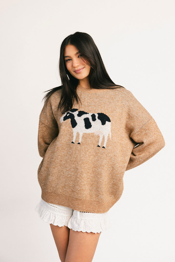 crewneck cow sweater with a relaxed fit. the perfect neutral cow detail sweater for spring outfits and lightweight layering.
