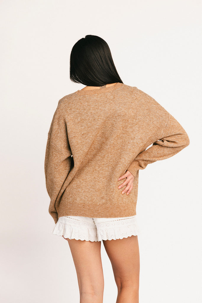 crewneck cow sweater with a relaxed fit. the perfect neutral cow detail sweater for spring outfits and lightweight layering.