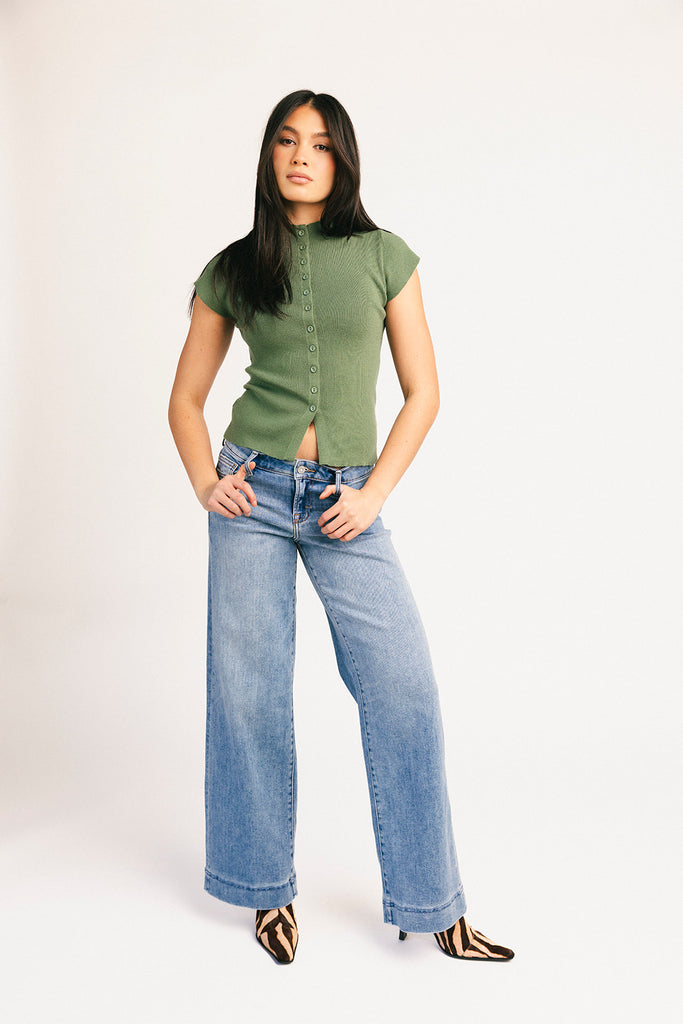 green short sleeve button up baby tee with a high neckline and an open front hemline. perfect elevated basic for date nights and casual outfits.