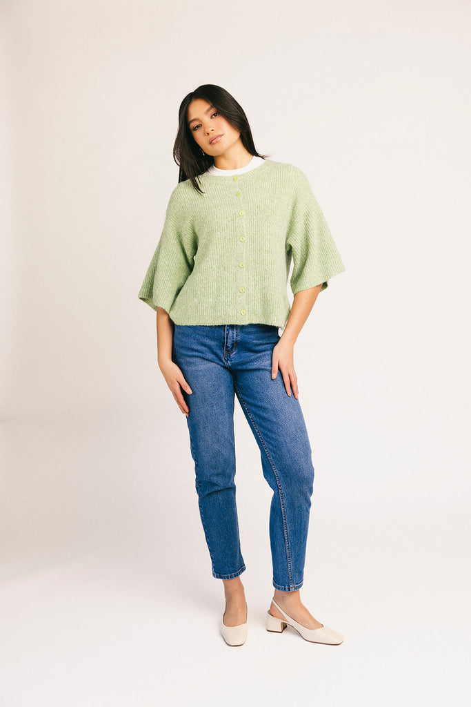 light green short sleeve cardigan with a slouchy, relaxed fit. perfect for casual outfits + lightweight layering.