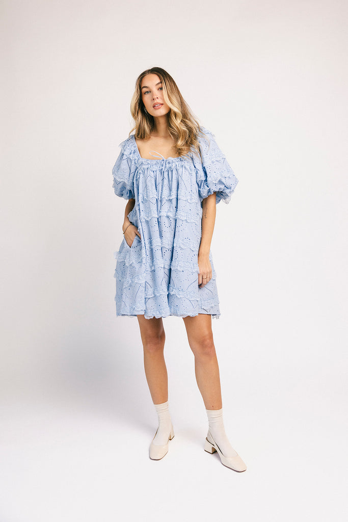 a blue puff sleeve mini dress with lace tiered details + a stretchy square neckline. perfect for family pictures, baby showers, weddings, + special occasions.