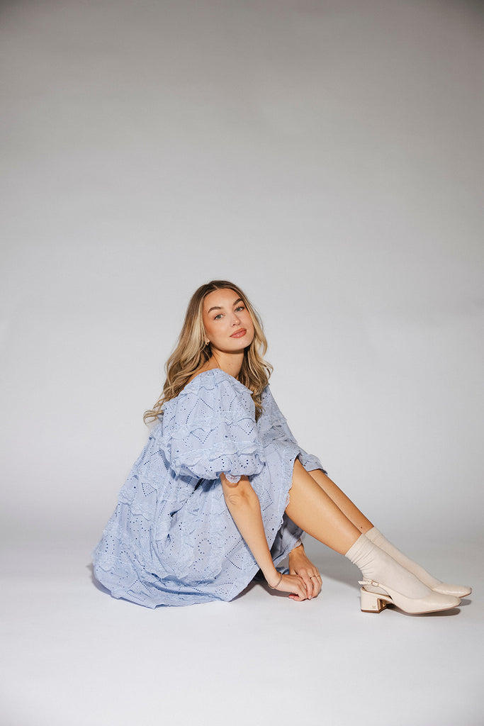 a blue puff sleeve mini dress with lace tiered details + a stretchy square neckline. perfect for family pictures, baby showers, weddings, + special occasions.