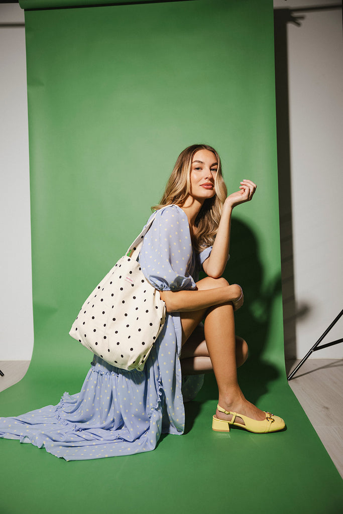 zoco daymaker dress: puff sleeve polka dot dress with an elastic neckline. the perfect blue and yellow polka dot dress for weddings, baby showers, + family pictures.
