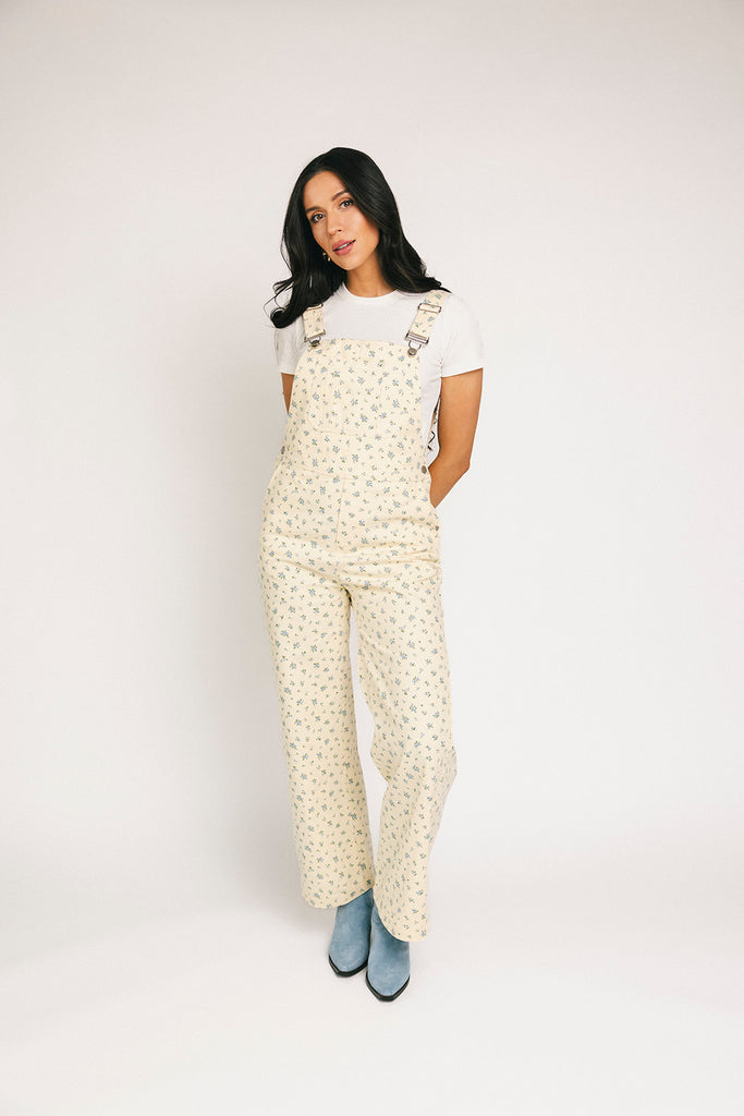 denim overalls with a ditsy blue floral pattern + straight leg fit. the perfect floral overalls for everyday wear + casual outfit styling.