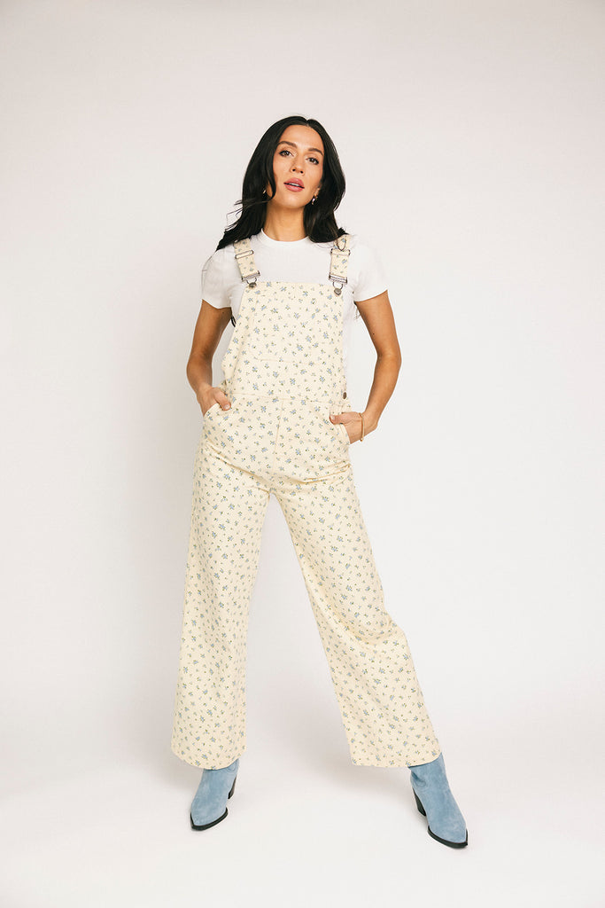 denim overalls with a ditsy blue floral pattern + straight leg fit. the perfect floral overalls for everyday wear + casual outfit styling.
