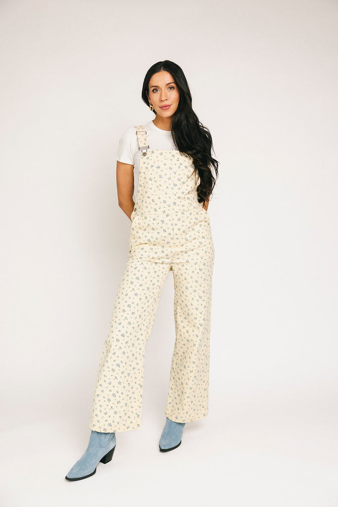 denim overalls with a ditsy blue floral pattern + straight leg fit. the perfect floral overalls for everyday wear + casual outfit styling.