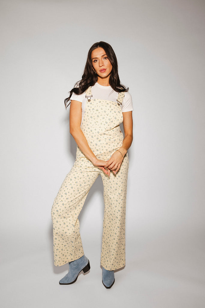 denim overalls with a ditsy blue floral pattern + straight leg fit. the perfect floral overalls for everyday wear + casual outfit styling.