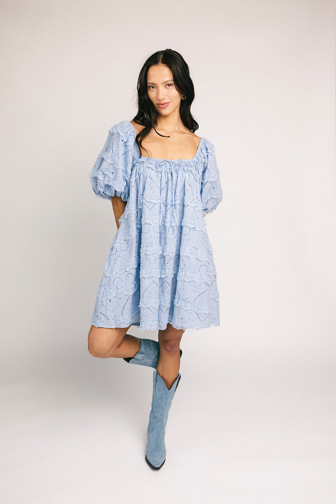 a blue puff sleeve mini dress with lace tiered details + a stretchy square neckline. perfect for family pictures, baby showers, weddings, + special occasions.