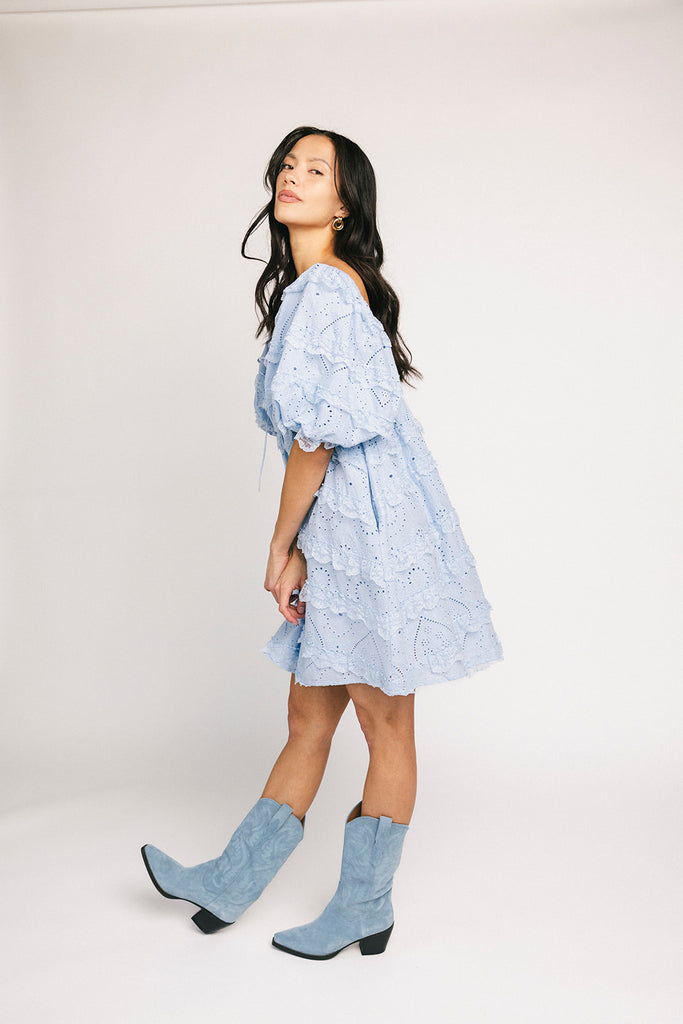 a blue puff sleeve mini dress with lace tiered details + a stretchy square neckline. perfect for family pictures, baby showers, weddings, + special occasions.