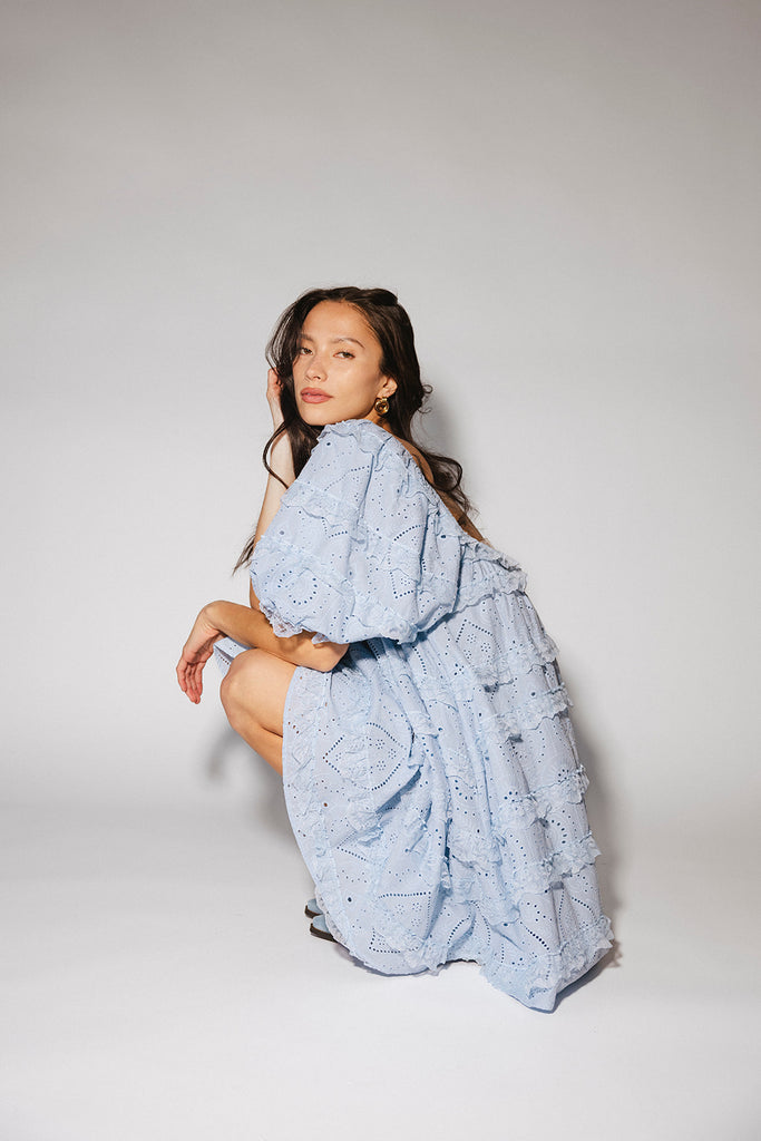a blue puff sleeve mini dress with lace tiered details + a stretchy square neckline. perfect for family pictures, baby showers, weddings, + special occasions.
