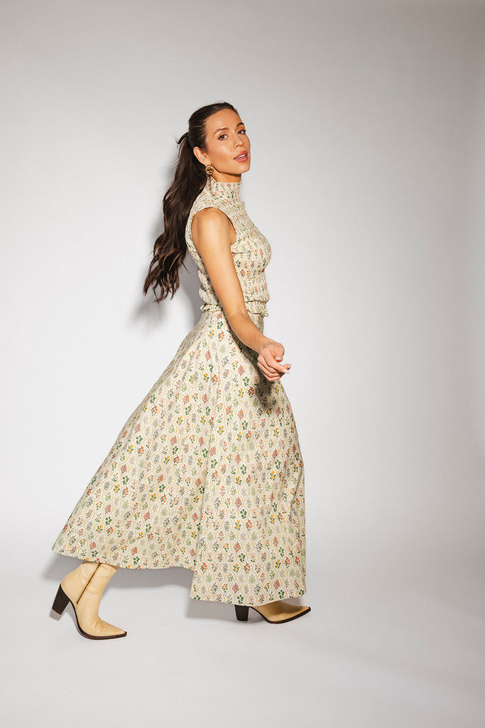 floral skirt set with a smocked mock neck tank + an a-line maxi skirt. the perfect elevated set for vacations, weddings, + fancy date nights.