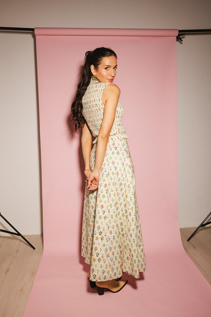 floral skirt set with a smocked mock neck tank + an a-line maxi skirt. the perfect elevated set for vacations, weddings, + fancy date nights.