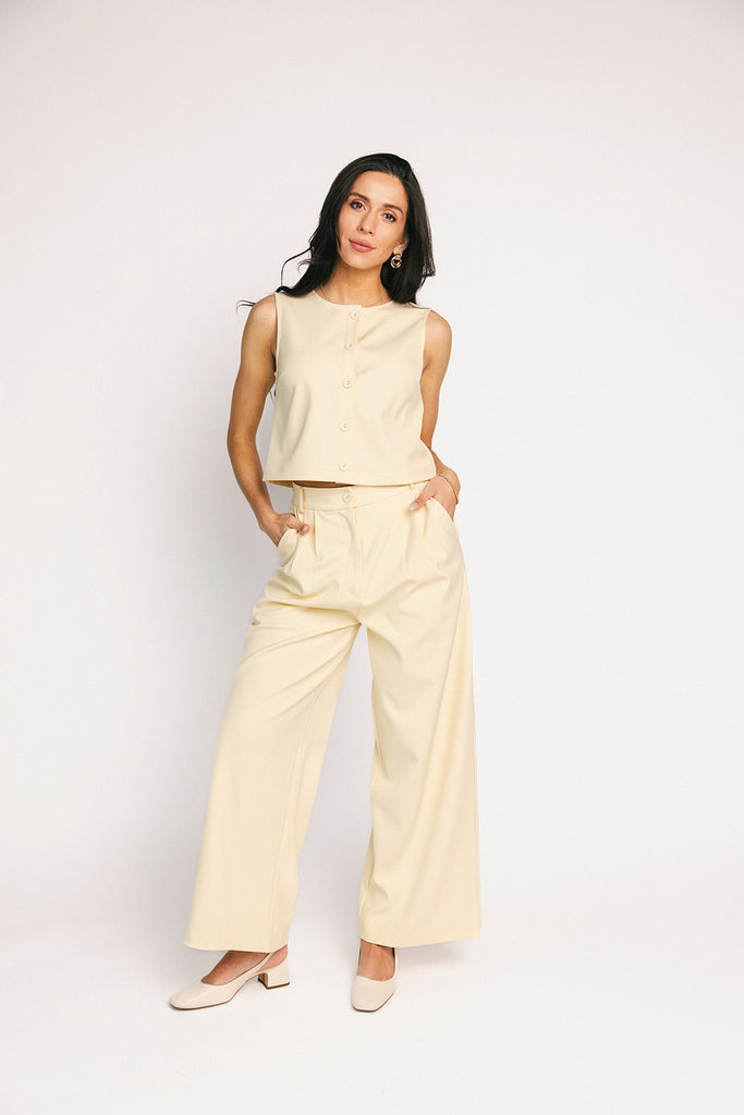 butter yellow pant set with a cropped button up tank + high waisted trousers. the perfect elevated set for the office + everyday wear.