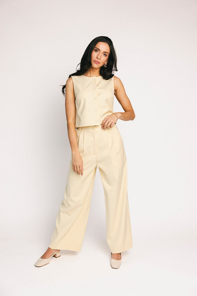 butter yellow pant set with a cropped button up tank + high waisted trousers. the perfect elevated set for the office + everyday wear.