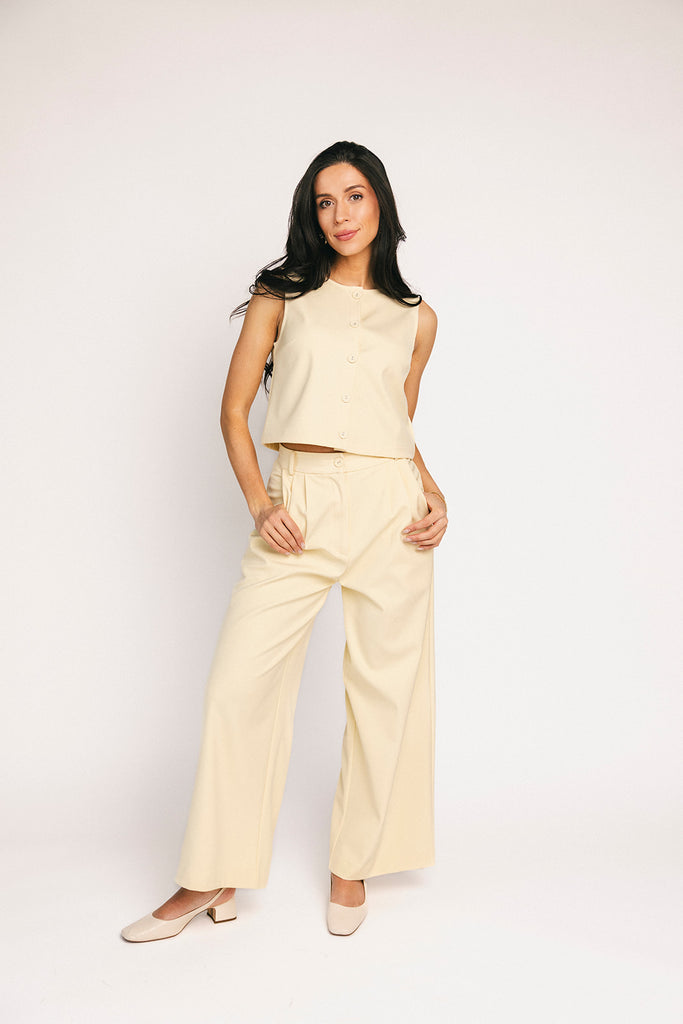 butter yellow pant set with a cropped button up tank + high waisted trousers. the perfect elevated set for the office + everyday wear.