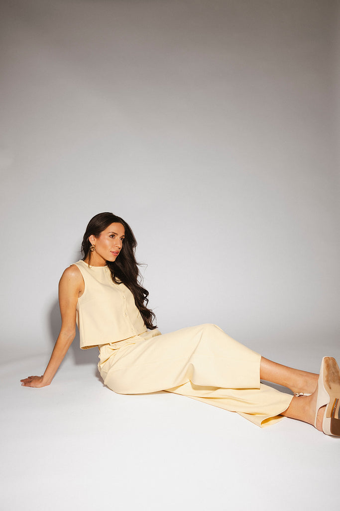 butter yellow pant set with a cropped button up tank + high waisted trousers. the perfect elevated set for the office + everyday wear.