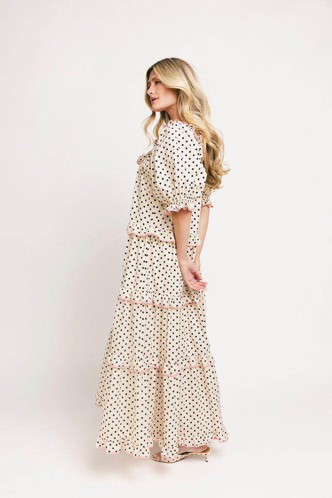 zoco daymaker dress: puff sleeve polka dot dress with an elastic neckline and pink trim details. perfect for weddings, baby showers, and family pictures.
