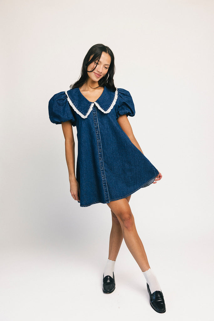 a puff sleeve denim dress with a lace trimmed collar detail. the perfect denim mini dress for date nights, family pictures, + everyday wear.