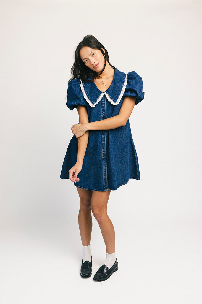 a puff sleeve denim dress with a lace trimmed collar detail. the perfect denim mini dress for date nights, family pictures, + everyday wear.