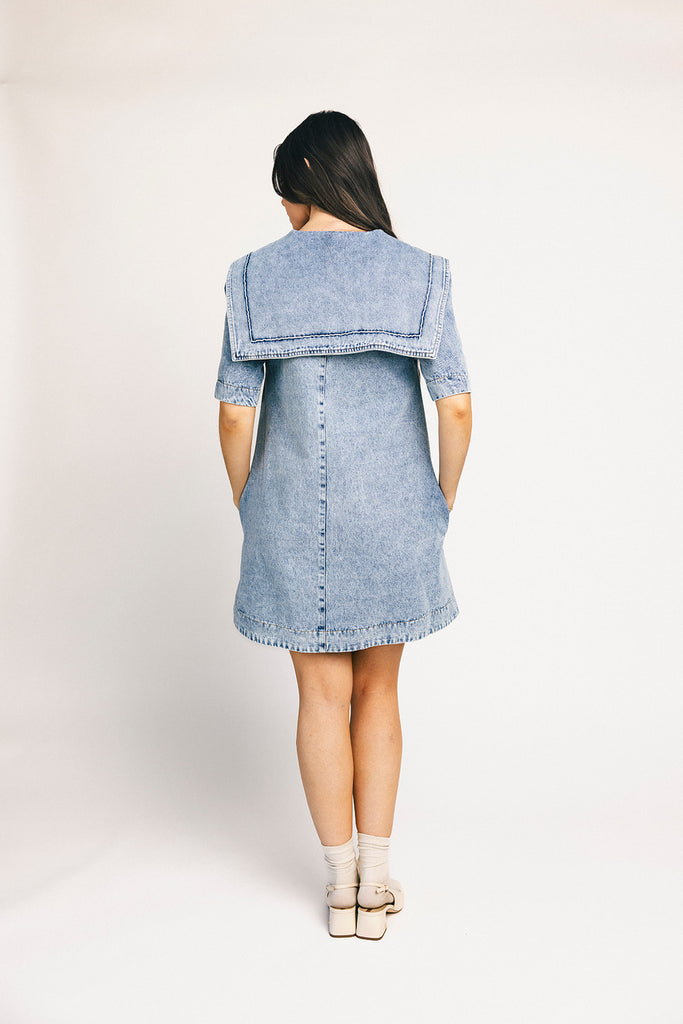 vintage-inspired short sleeve denim dress with an oversized collar + bow detail. the perfect denim mini dress for date nights, family pictures, + everyday wear.