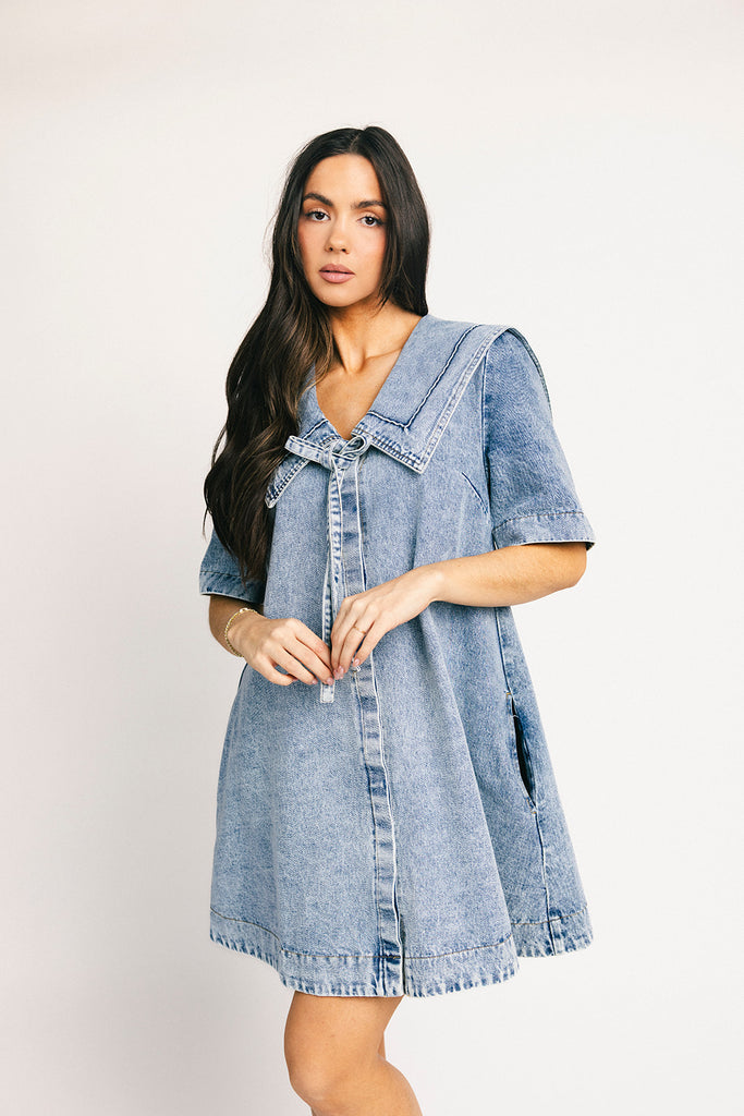 vintage-inspired short sleeve denim dress with an oversized collar + bow detail. the perfect denim mini dress for date nights, family pictures, + everyday wear.