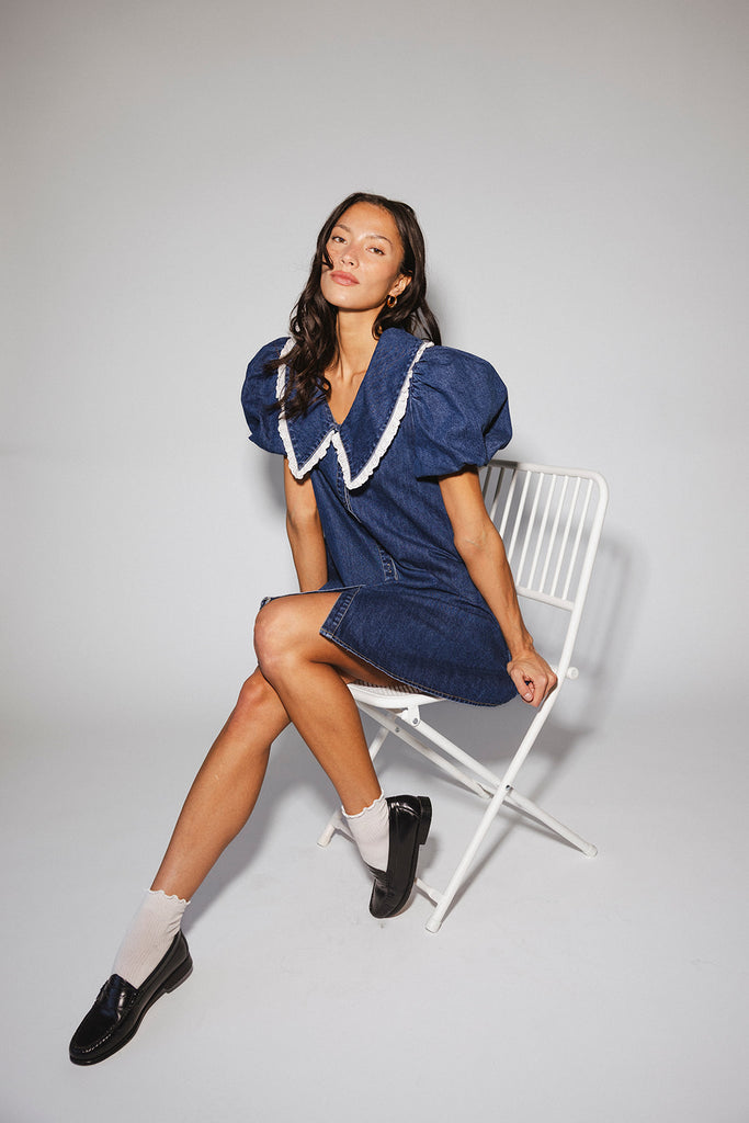 a puff sleeve denim dress with a lace trimmed collar detail. the perfect denim mini dress for date nights, family pictures, + everyday wear.