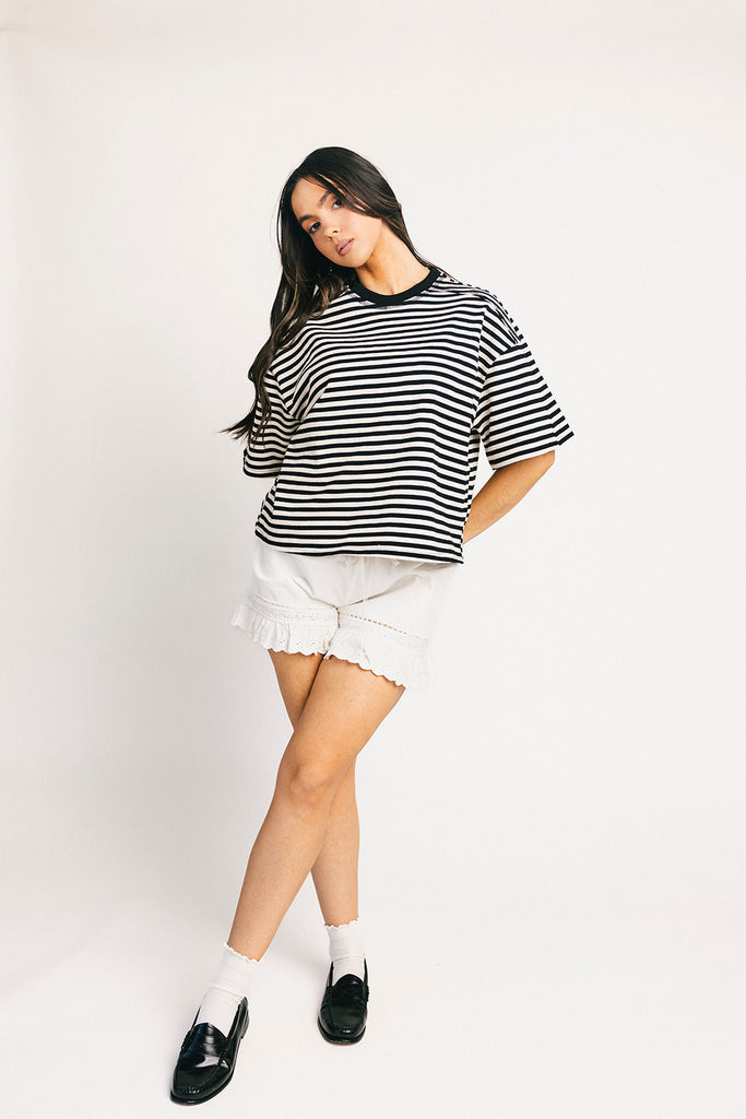 oversized black and white striped t-shirt for women. the perfect boxy striped tee for concerts, airport outfits, + casual date nights.