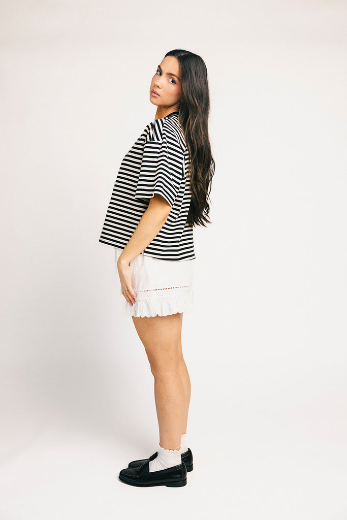 oversized black and white striped t-shirt for women. the perfect boxy striped tee for concerts, airport outfits, + casual date nights.