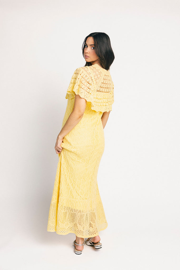 butter yellow crochet maxi dress with a chic cape overlay. the perfect spring + summer dress for weddings, bridal showers, + garden parties.