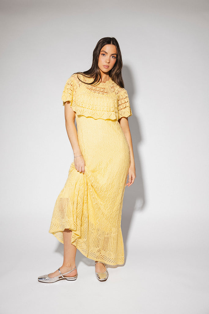 butter yellow crochet maxi dress with a chic cape overlay. the perfect spring + summer dress for weddings, bridal showers, + garden parties.