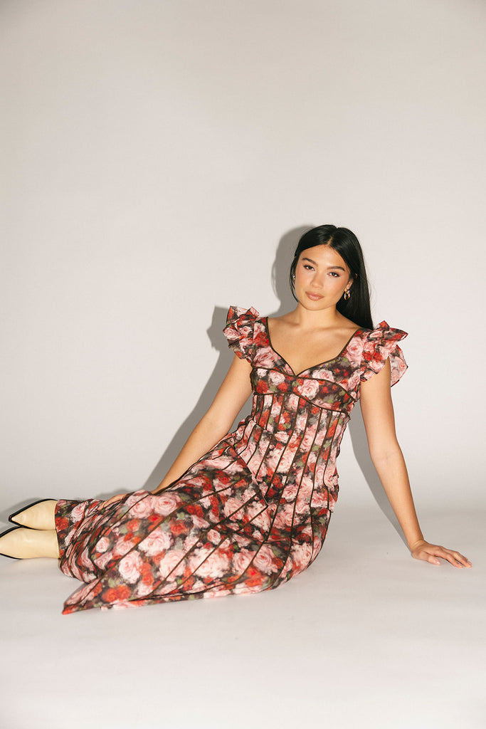 vintage-inspired floral dress with a sweetheart neckline + flutter sleeves. the perfect occasion dress for weddings, bridal showers, + formal events.