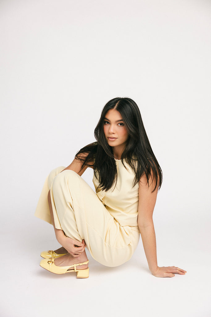 butter yellow pant set with a cropped button up tank + high waisted trousers. the perfect elevated set for the office + everyday wear.