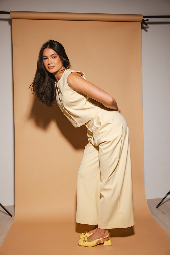 butter yellow pant set with a cropped button up tank + high waisted trousers. the perfect elevated set for the office + everyday wear.