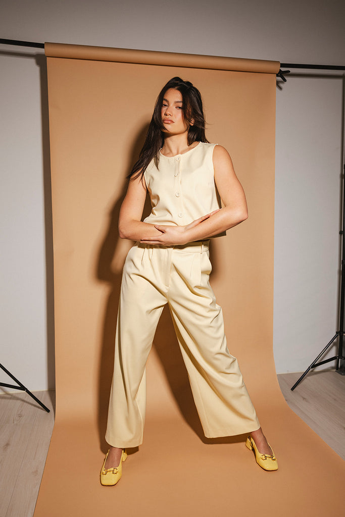 butter yellow pant set with a cropped button up tank + high waisted trousers. the perfect elevated set for the office + everyday wear.