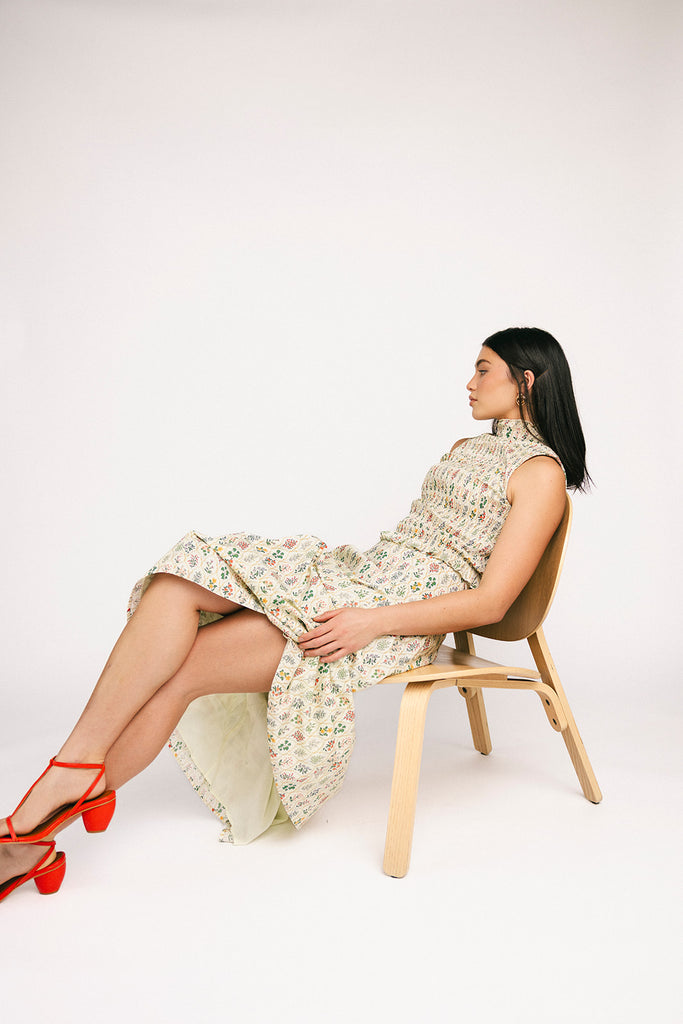 floral skirt set with a smocked mock neck tank + an a-line maxi skirt. the perfect elevated set for vacations, weddings, + fancy date nights.