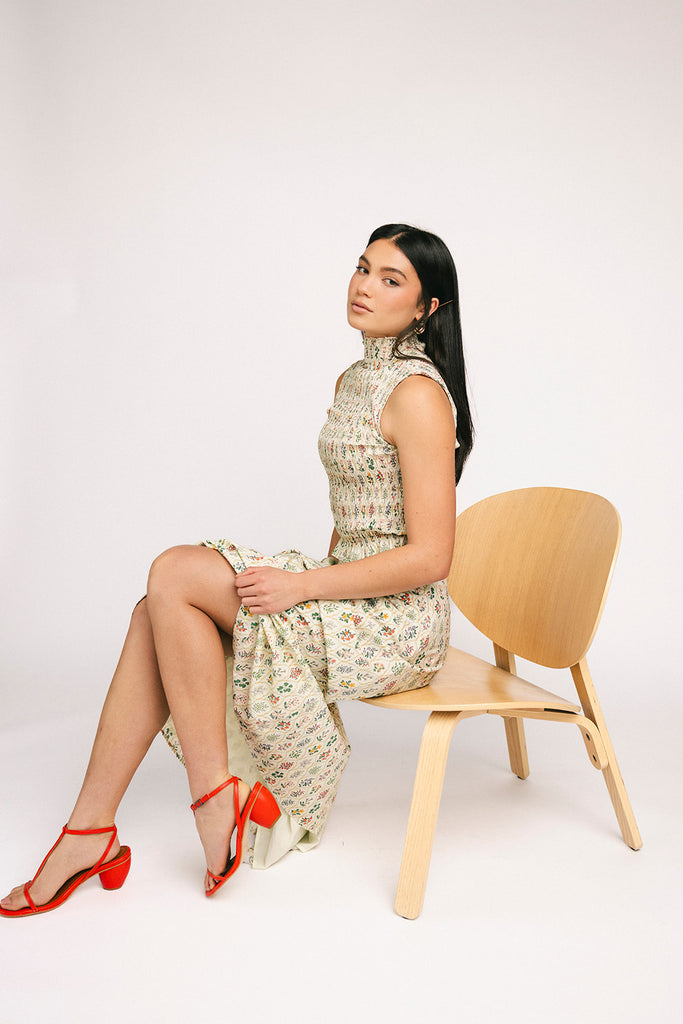 floral skirt set with a smocked mock neck tank + an a-line maxi skirt. the perfect elevated set for vacations, weddings, + fancy date nights.