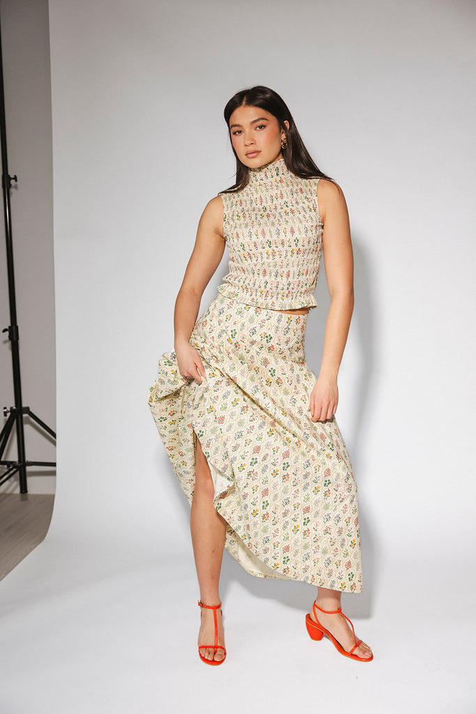 floral skirt set with a smocked mock neck tank + an a-line maxi skirt. the perfect elevated set for vacations, weddings, + fancy date nights.