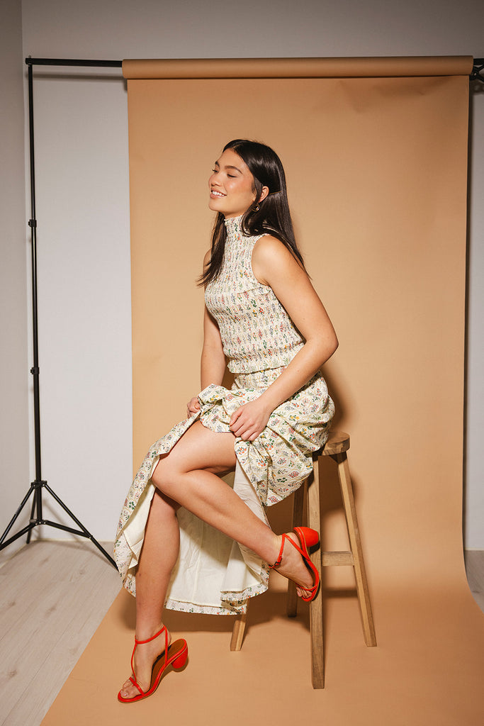 floral skirt set with a smocked mock neck tank + an a-line maxi skirt. the perfect elevated set for vacations, weddings, + fancy date nights.