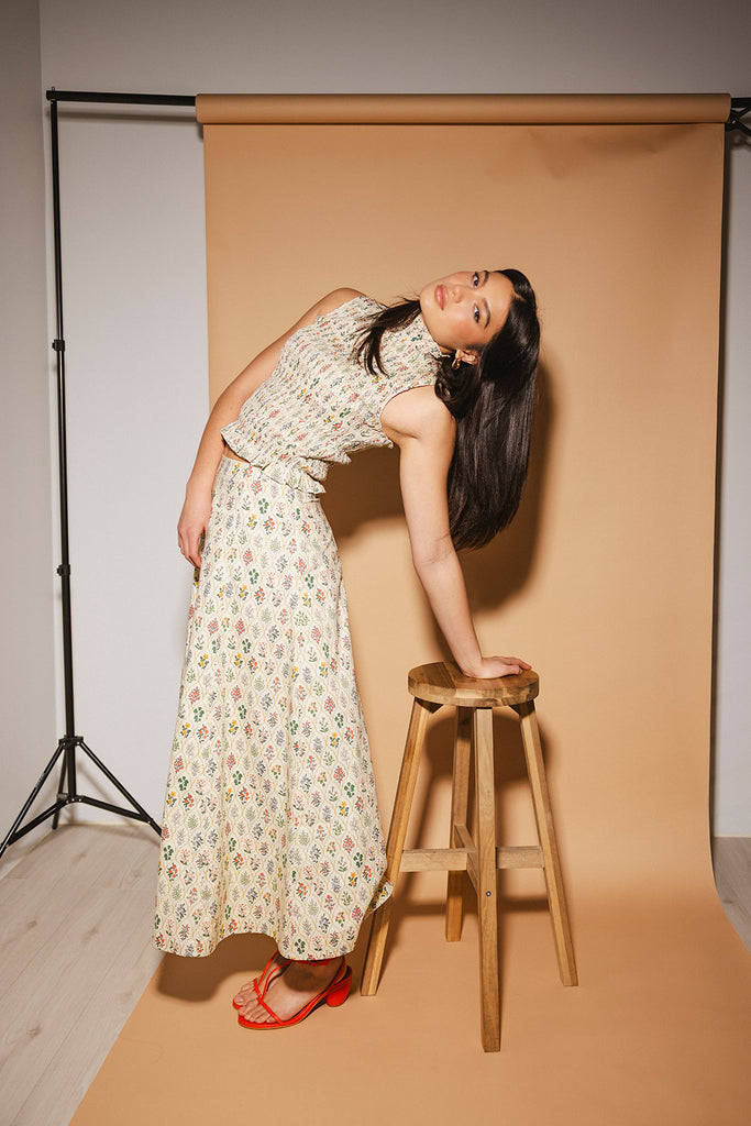 floral skirt set with a smocked mock neck tank + an a-line maxi skirt. the perfect elevated set for vacations, weddings, + fancy date nights.