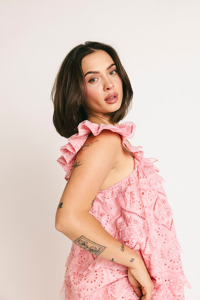 vintage inspired pink lace maxi dress with an elastic neckline and tiered ruffle details. perfect for weddings, bridal showers, and baby showers.