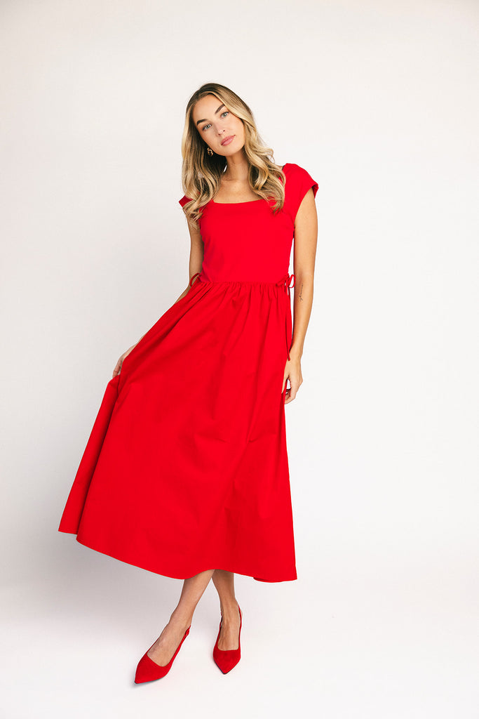 zoco afterglow dress: red short sleeve midi dress with a square neckline and side ties. perfect for date nights, weddings, and family pictures.