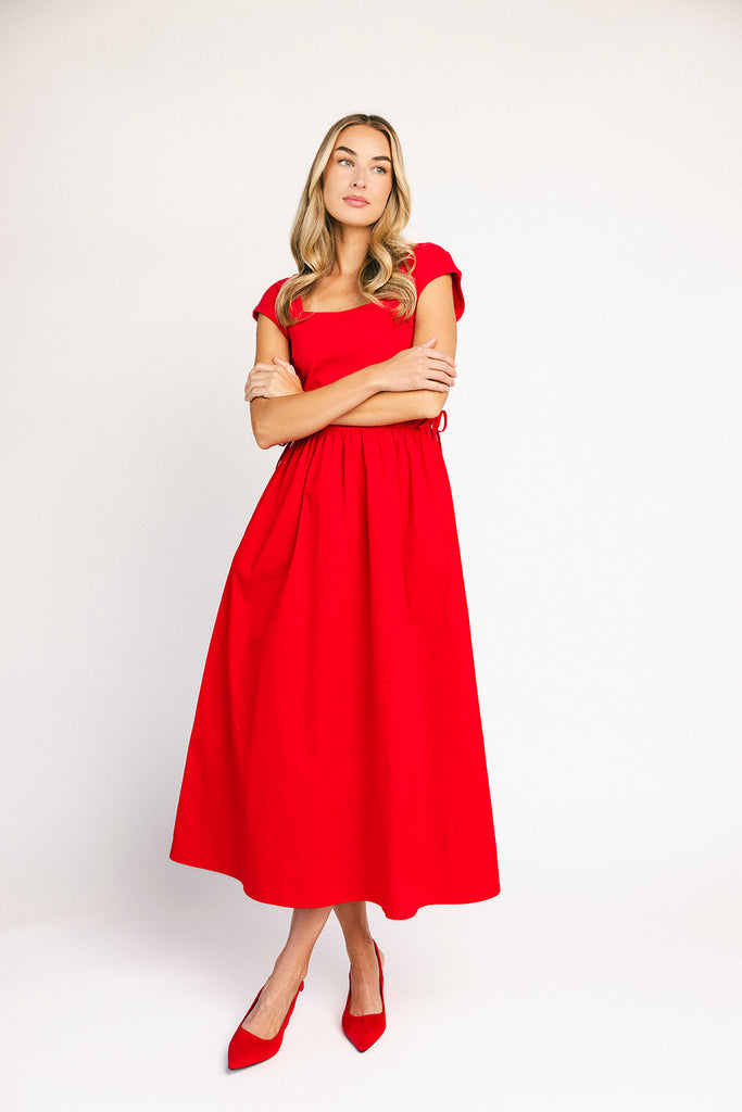 zoco afterglow dress: red short sleeve midi dress with a square neckline and side ties. perfect for date nights, weddings, and family pictures.