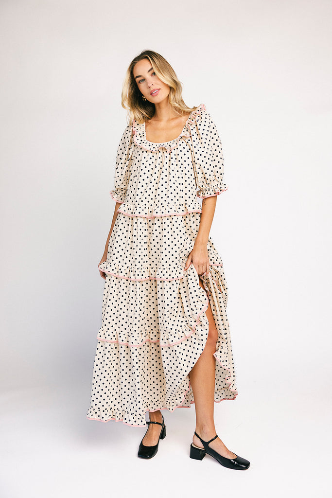 zoco daymaker dress: puff sleeve polka dot dress with an elastic neckline and pink trim details. perfect for weddings, baby showers, and family pictures.