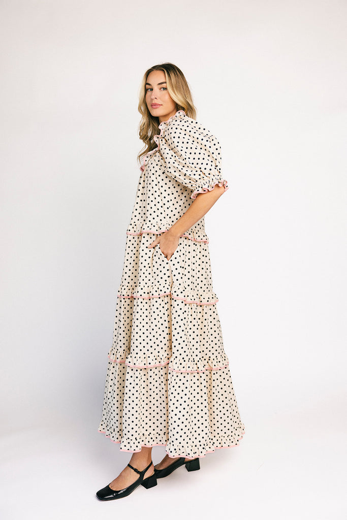 zoco daymaker dress: puff sleeve polka dot dress with an elastic neckline and pink trim details. perfect for weddings, baby showers, and family pictures.