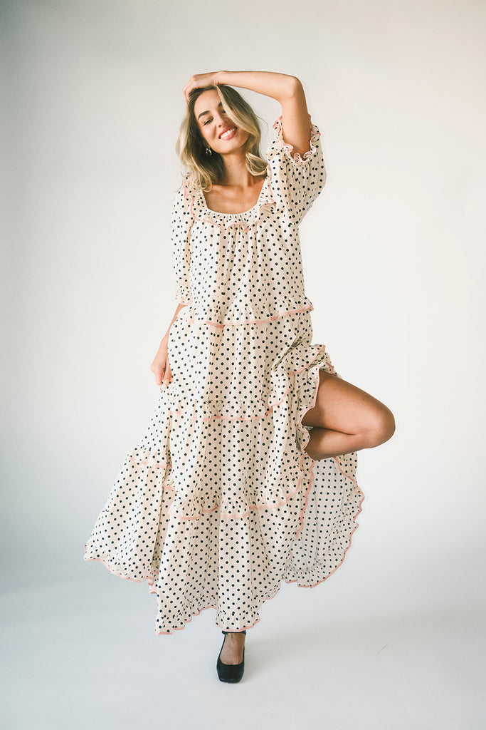 zoco daymaker dress: puff sleeve polka dot dress with an elastic neckline and pink trim details. perfect for weddings, baby showers, and family pictures.