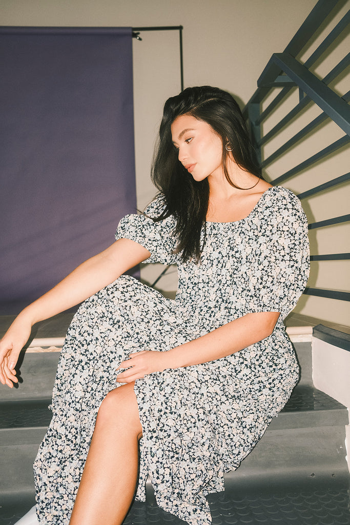 puff sleeve blue floral maxi dress with an elastic neckline. perfect for weddings, baby showers, and family pictures.